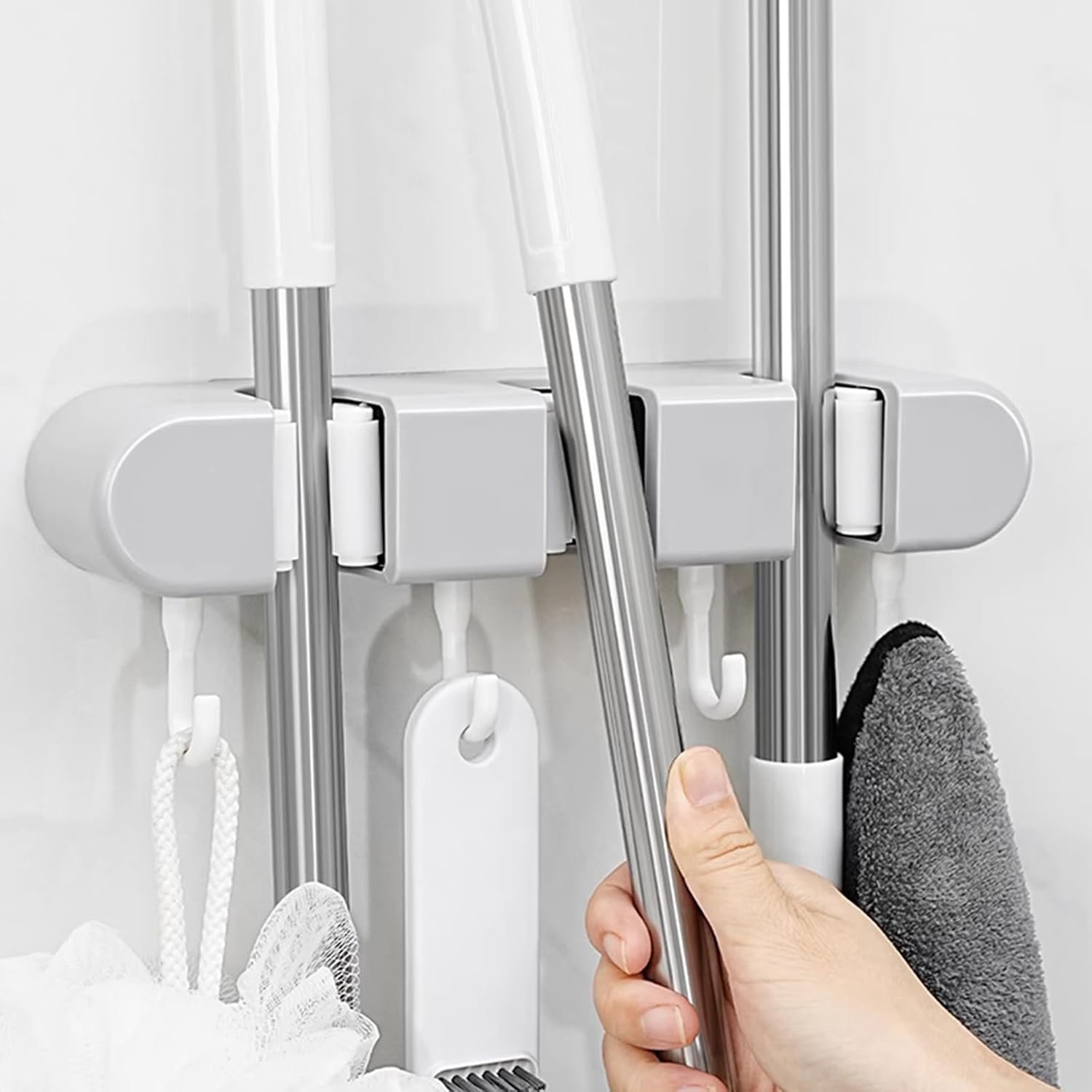 Wall Mounted Storage Rack for Mops and Brooms Ultimate Home Organization Solution with Holders and Hooks for Space()